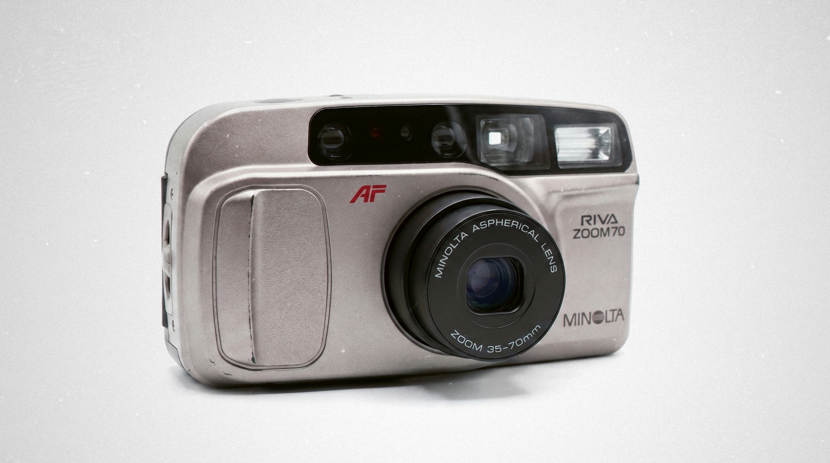 Minolta Riva Zoom 70 (Автоматична 35мм камера) | iPolaroid
